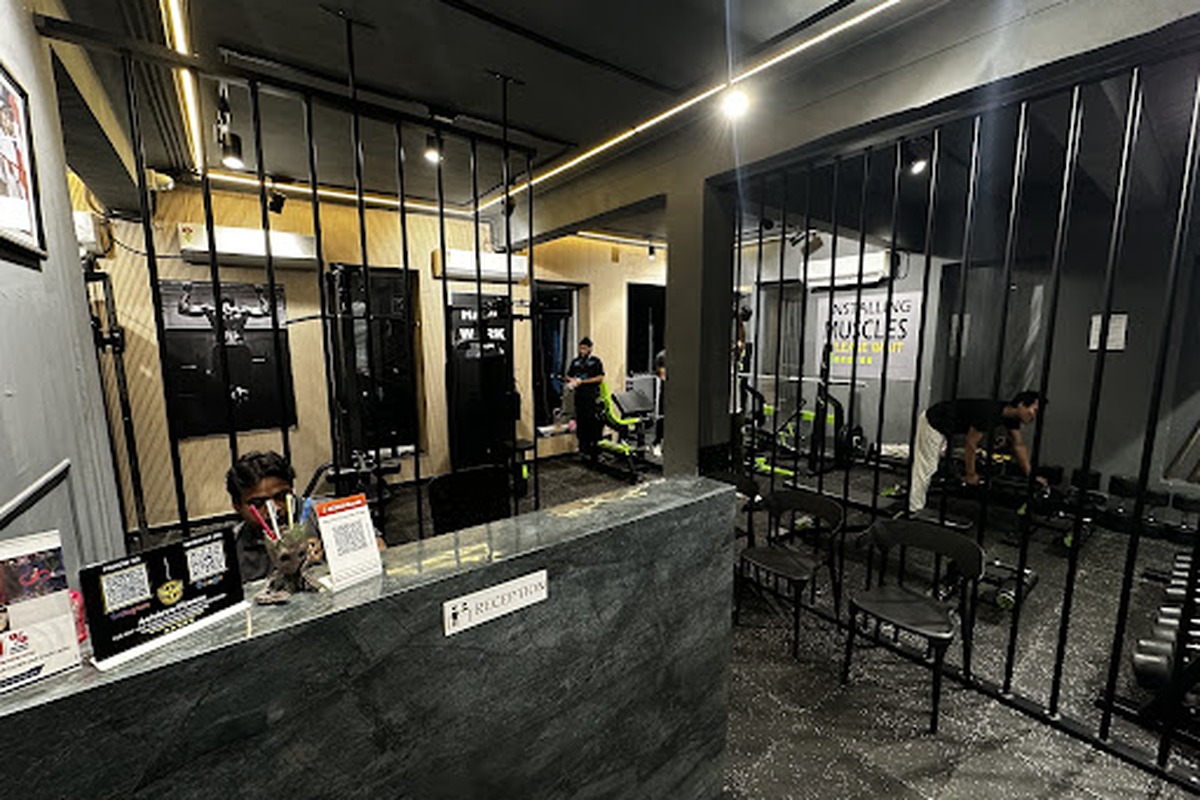 Dark Marble Reception and Free Weight Training Floor