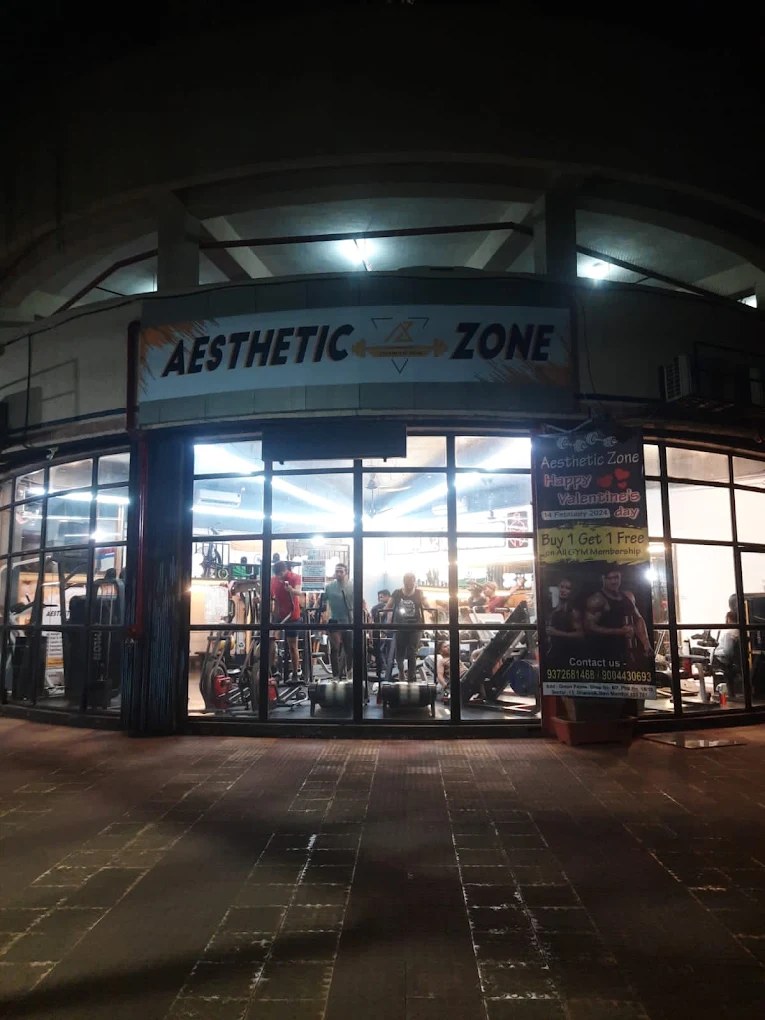 AESTHETIC ZONE Curved Illuminated Glass Storefront at Green Palms