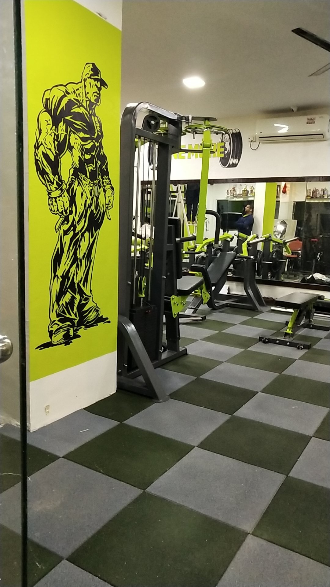 ATHARVA FITNESS CENTRE Training Floor, Cable Station & Neon Wall Art