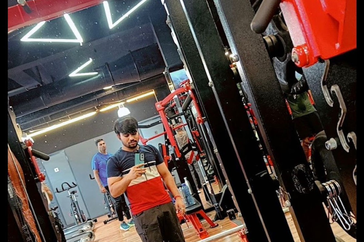 Olympic Squat Cage, Barbell Platform and Cardio Area View