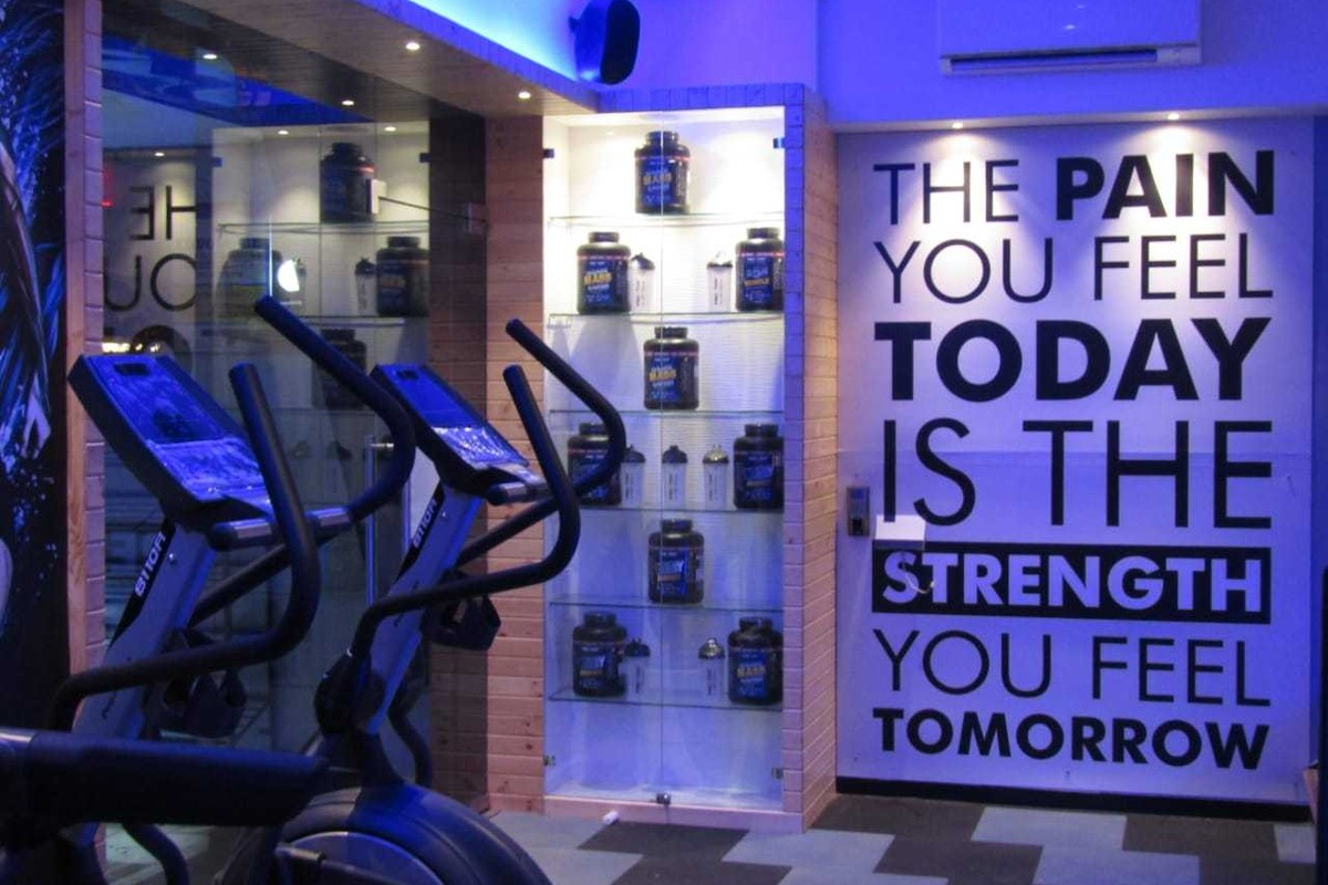 Supplement Showcase, Spin Bikes and Motivational Wall Art