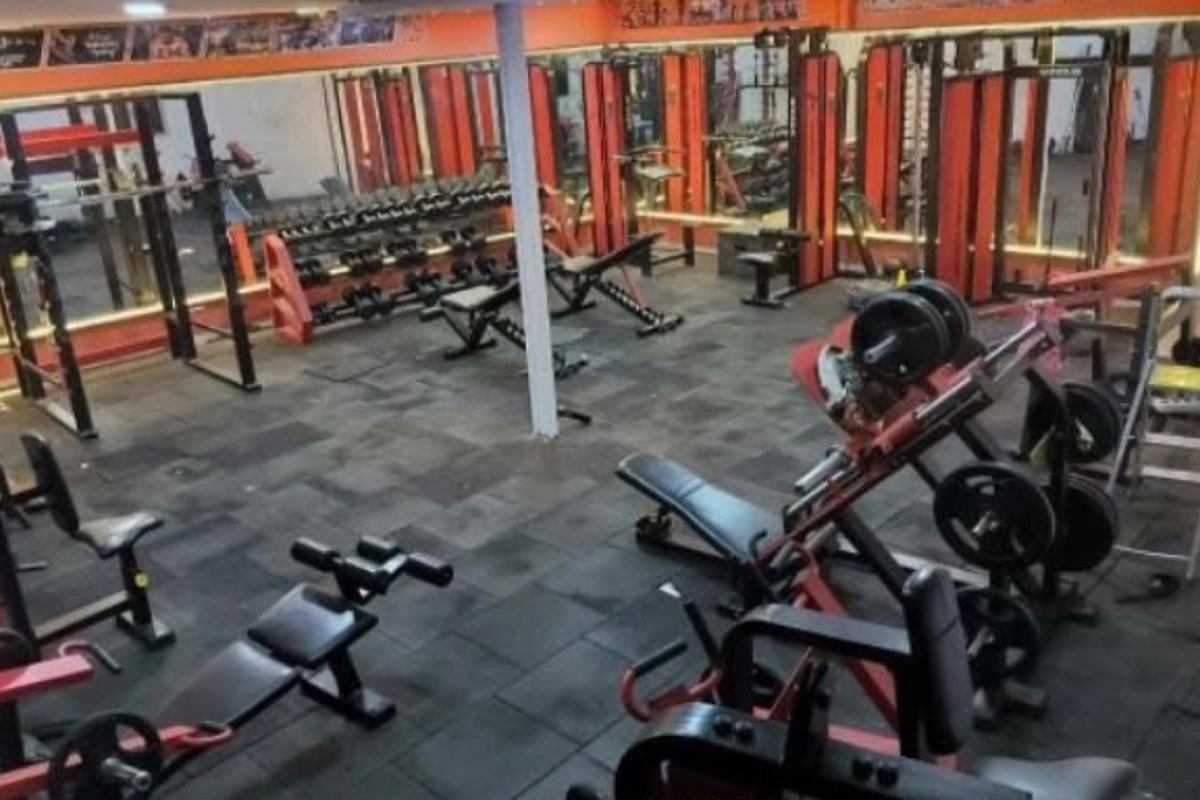 Elevated View of Strength Training Floor, Linear Leg Press and Rubber Floor