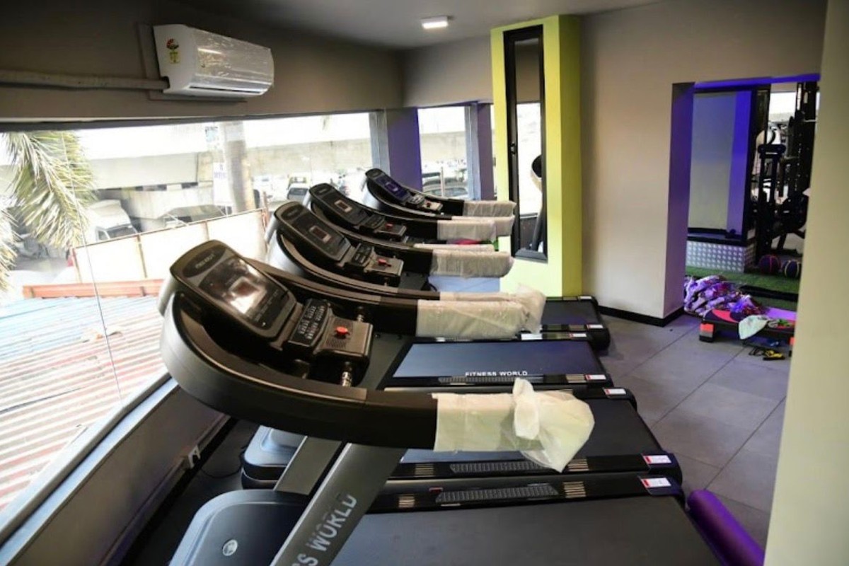 Fitness World Motorized Treadmills Facing S.V. Road and JVLR Flyover
