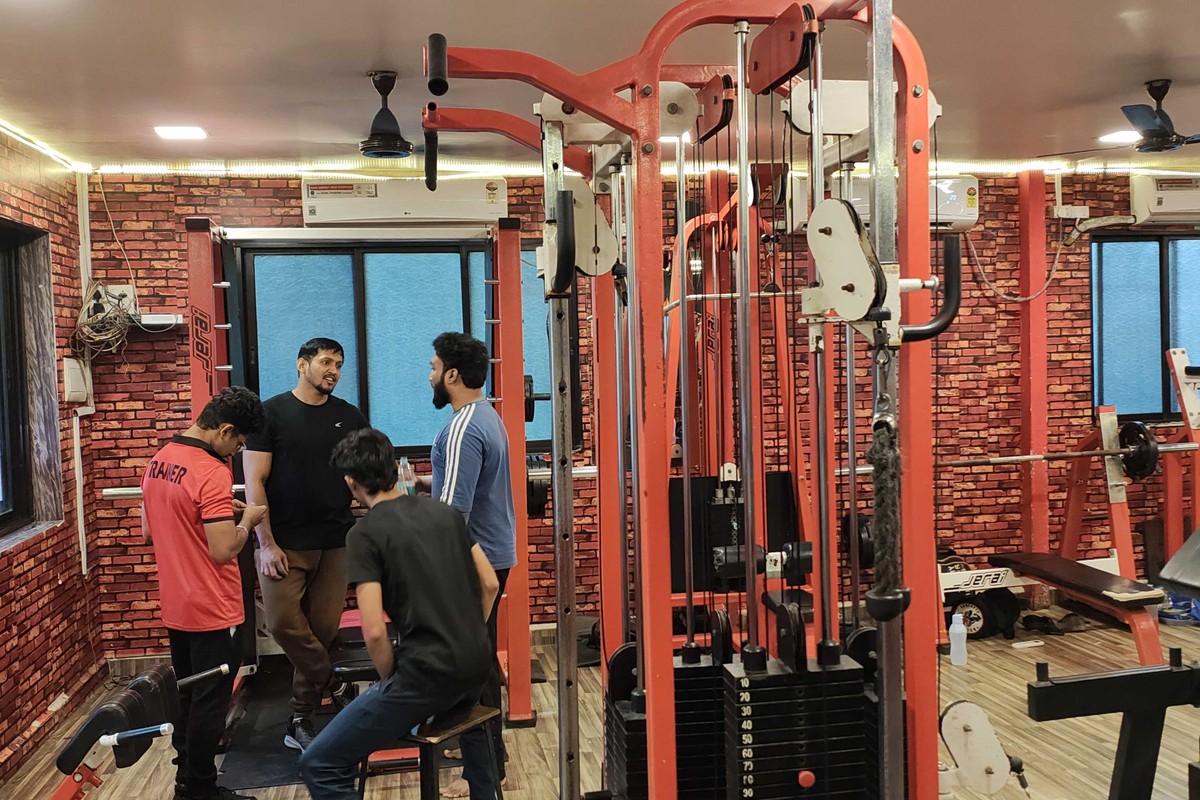 Trainer-Guided Cable Crossover Tower and Upper Body Workout Floor