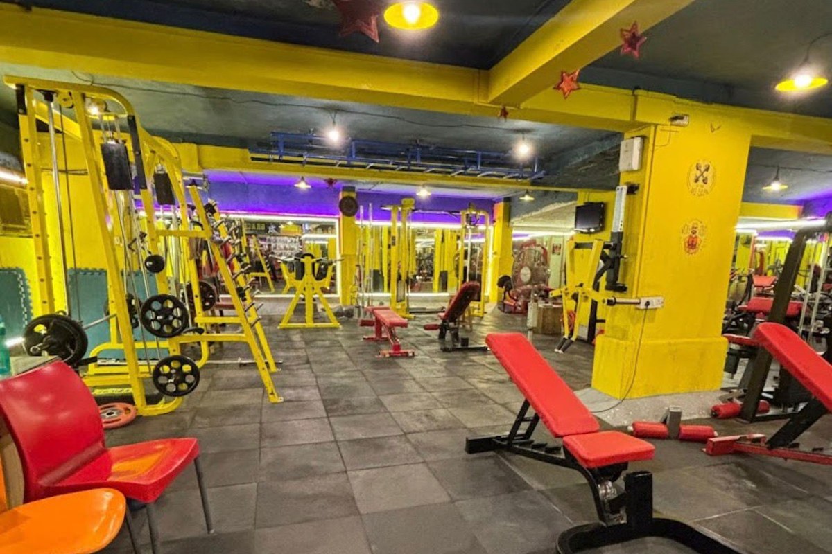 Yellow Power Squat Cages, Smith Machine and Incline Benches