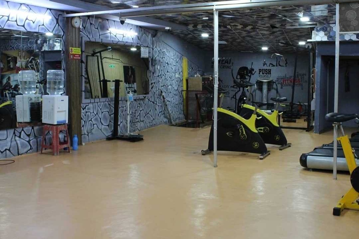Dedicated Cardio Zone with Upright Spin Bikes, Treadmill and Yoga Studio Space
