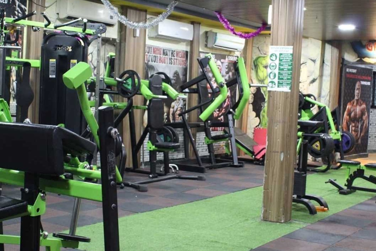 Plate-Loaded Chest and Shoulder Press Stations with Preacher Curl