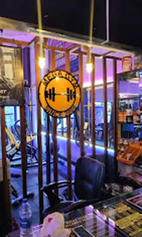MEGA GYM Reception & Since 2010 Emblem