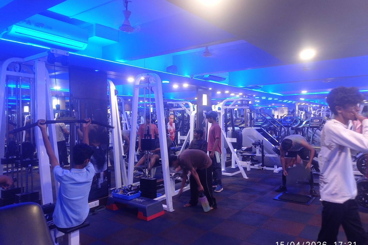 Cable Crossovers with Cardio Treadmill Deck in Background