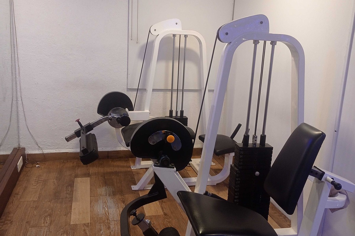 Dedicated Leg Extension and Leg Curl Isolation Bay