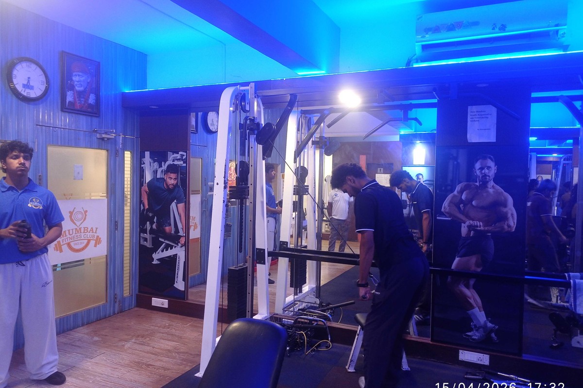 Certified Trainer and Cable Lat Pulldown Station
