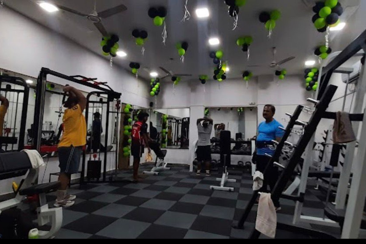 Strength Training Floor with Checkerboard Rubber Tiles and Cable Crossover