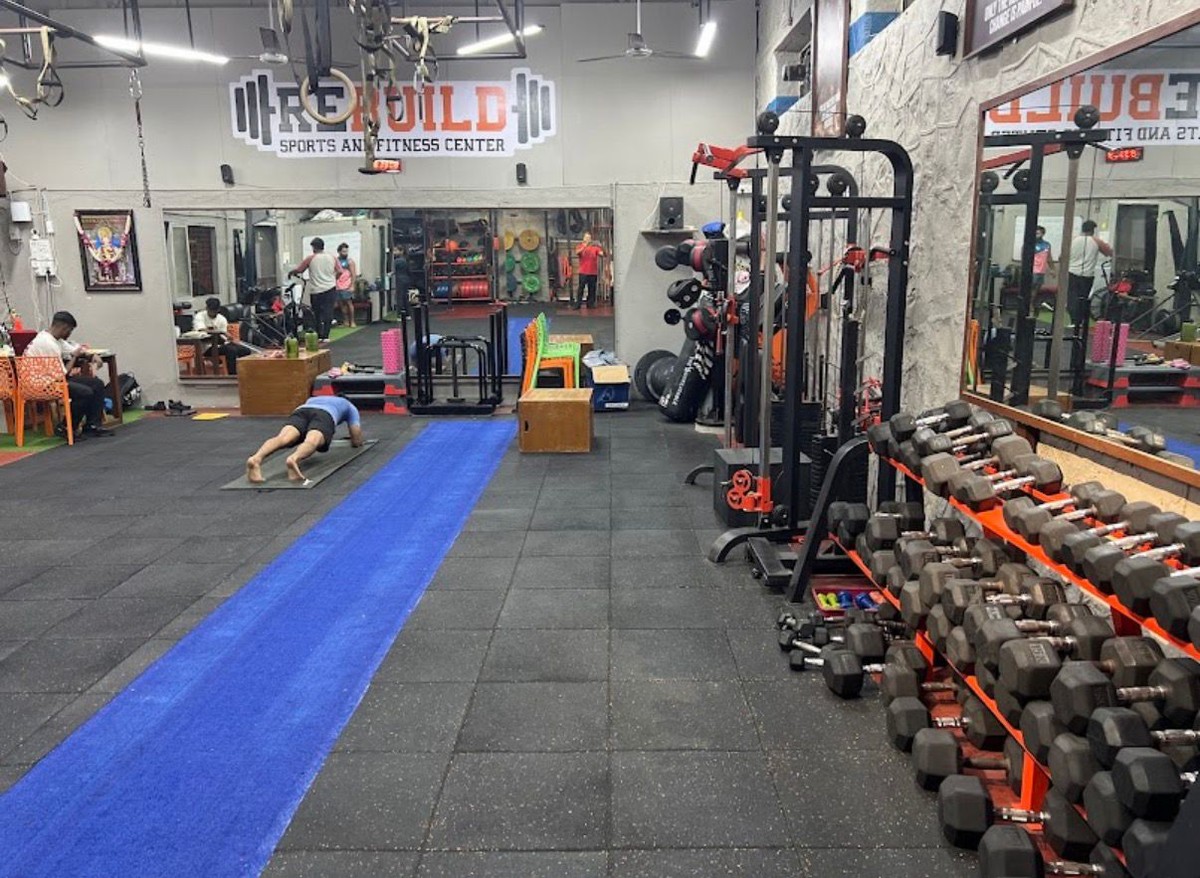 Blue Sprint Turf Track and Dumbbell Racks