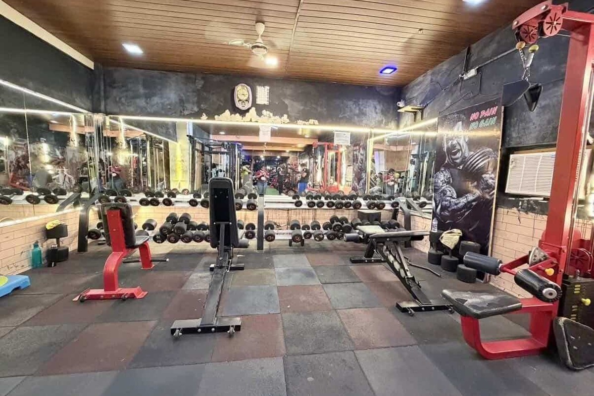Refuel Fitness Heavy Free Weights Dumbbell Bay with Backlit Mirrors and Benches