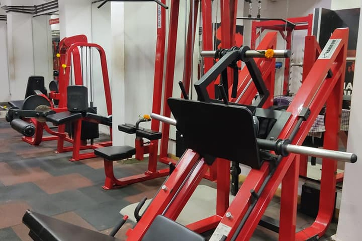Plate Loaded 45-Degree Leg Press and Red Lat Pulldown Machine