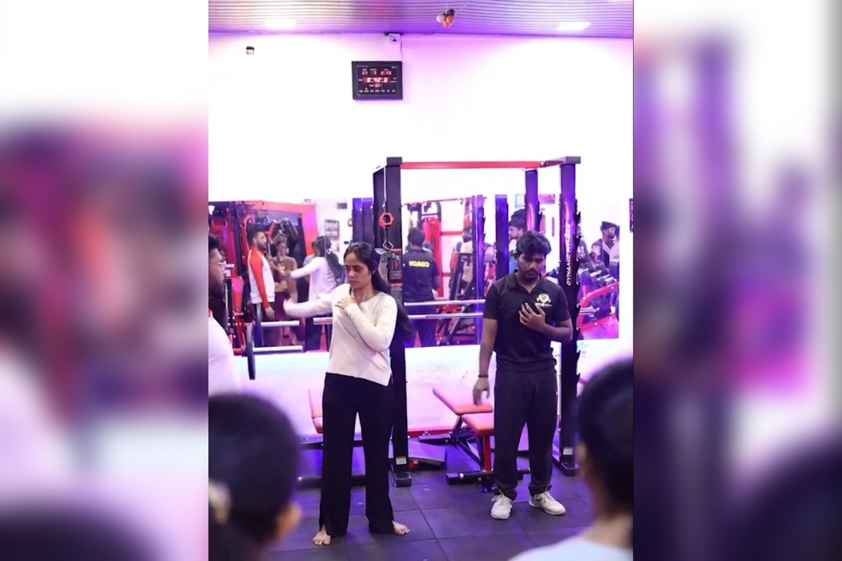 Group Studio Floor with Members Participating in Zumba and HIIT Session